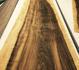 A wide sheet of sappy Grissard wood veneer that's been fumed, has high contrast.