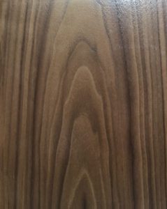 A sample of American Walnut with a Flat Cut setructure in the shape of a cathedral. 