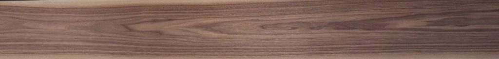Flatcut Walnut veneer with one-directional cathedral grain structure.