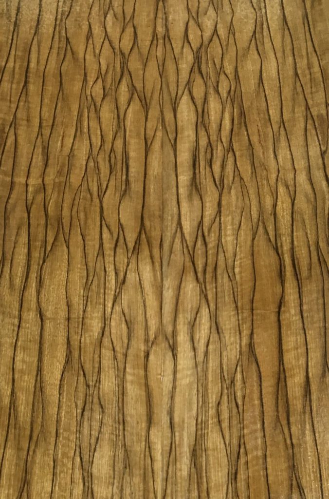 Finished Black Limba, book matched, 12+ inch widths, 10' length.